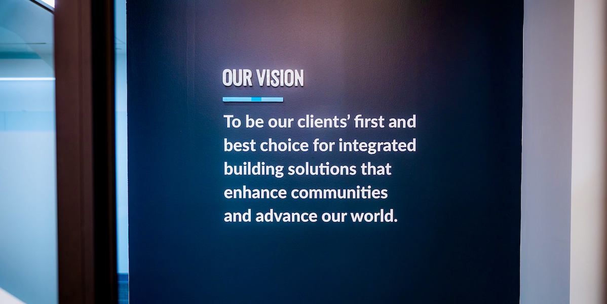 Hourigan's vision painted on a branded wall.